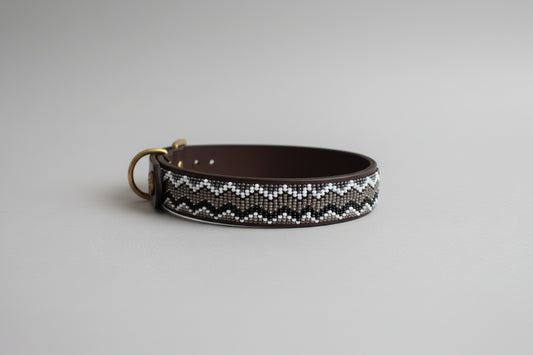 Dog collar with decorative pattern on a grey background