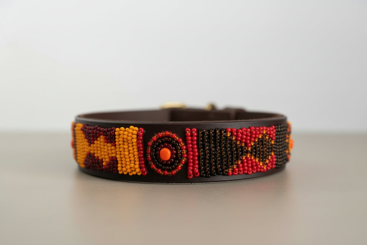 Beaded dog collar with geometric patterns on a neutral background