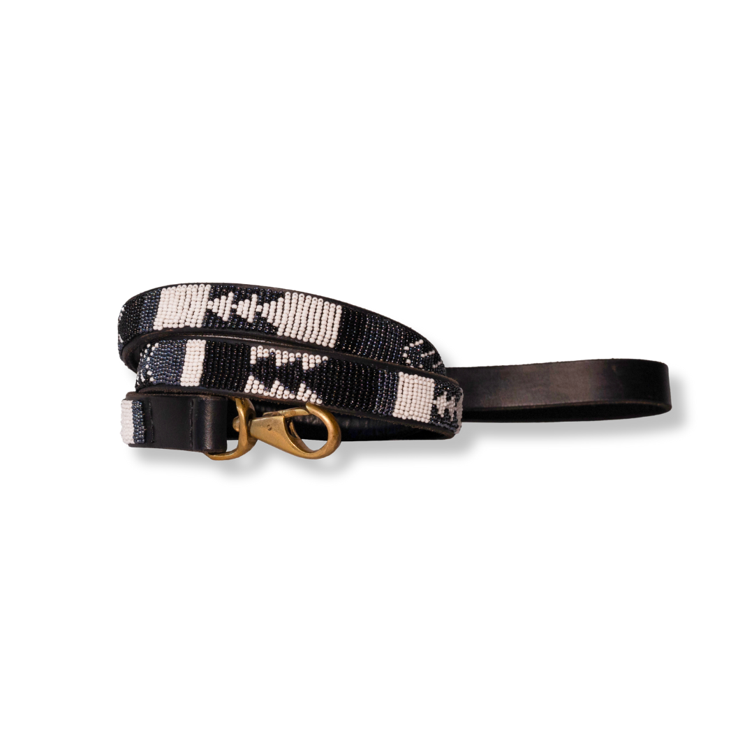 Dog leash with black and white pattern on a white background