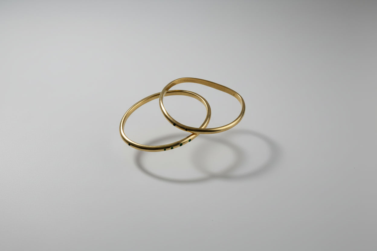 Oval brass bangle with Cowhorn dots 2
